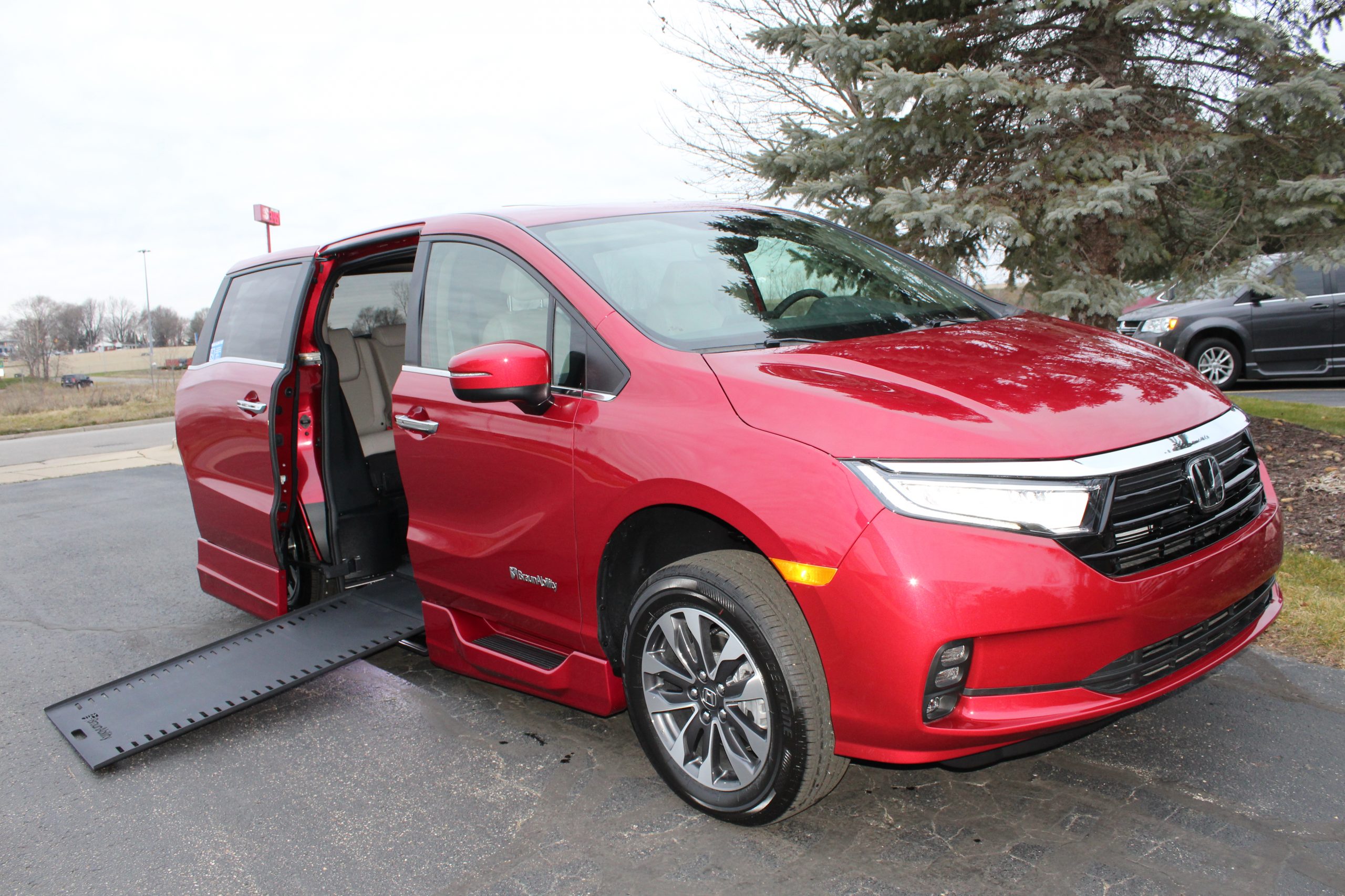 2023 Radiant Red Honda Odyssey EX-L with BraunAbility XI Infloor Conversion