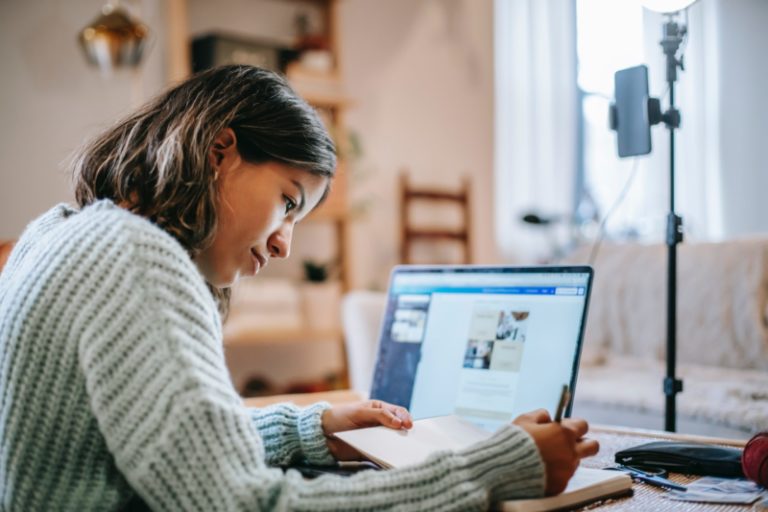 young woman working at home