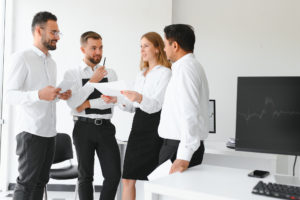 Business team working on their business project together at office