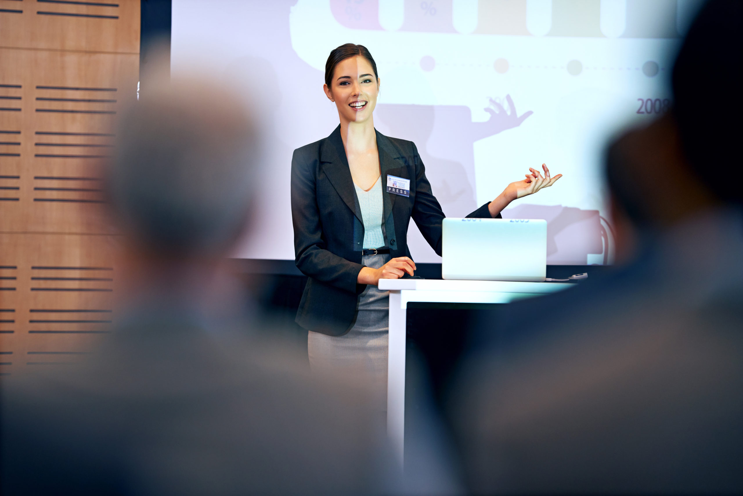 A young professional leading a presentation